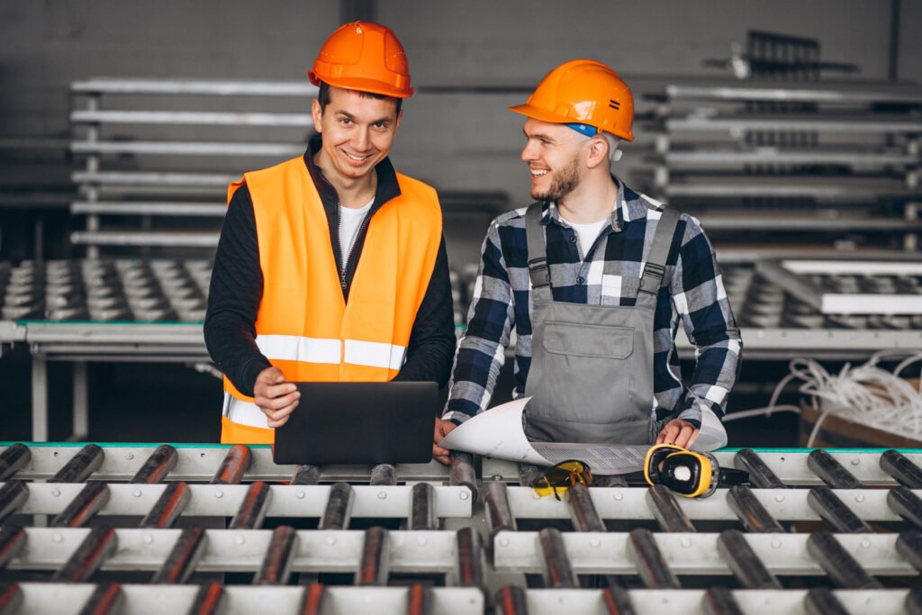 Two colleagues at a factory Divya mesh doors